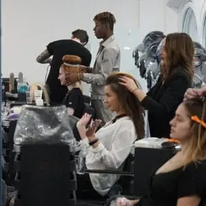 How to become a Hairdresser in 2025 3 Hairdressing - Group shot of Central Hairdressing learners styling clients hair