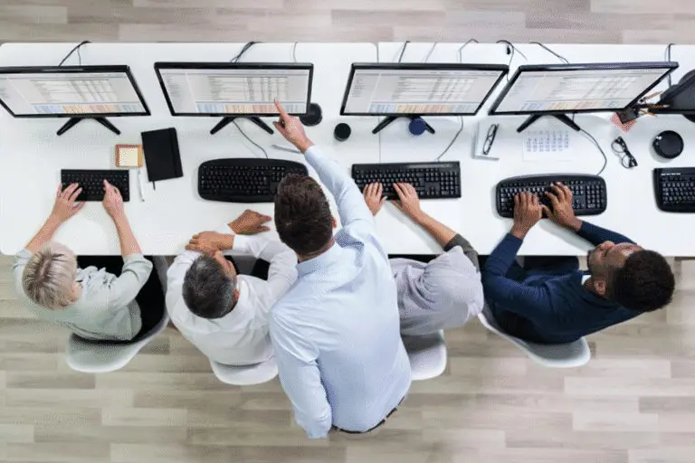 Several people working at computer screens