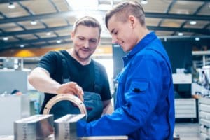 employer training an apprentice