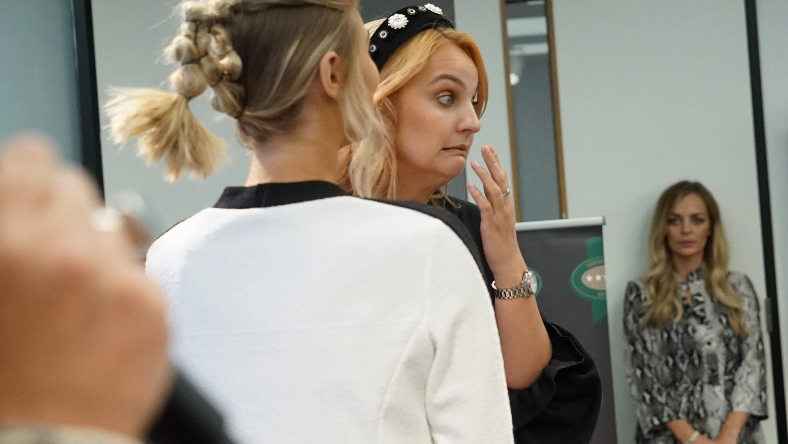 Hairdressing student looking surprised