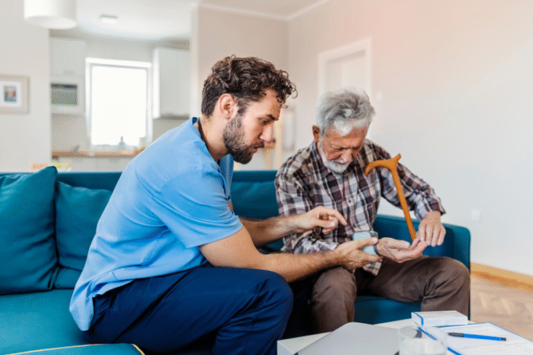 A young man listens to and helps and old man